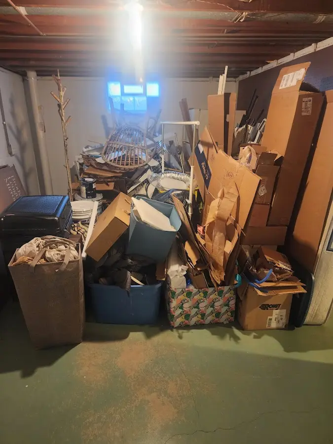 Roll-off dumpster container at job site for 20 Yard Dumpster Rental in Macon-Bibb County